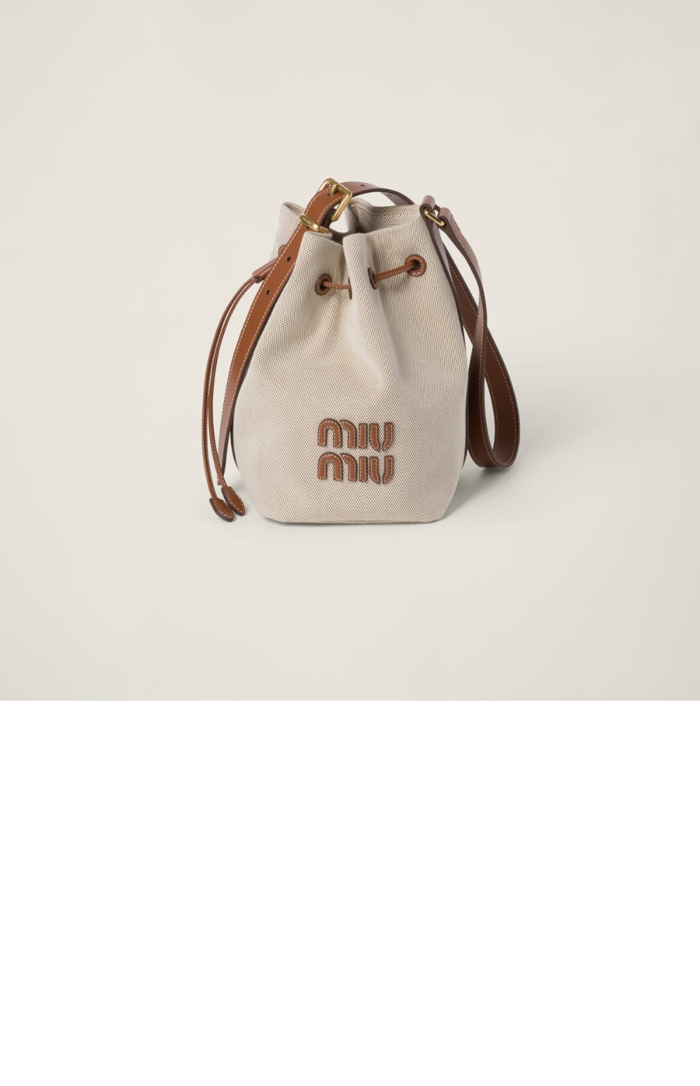 미우미우 캔버스 및 가죽 버킷 미듐백 5BE090