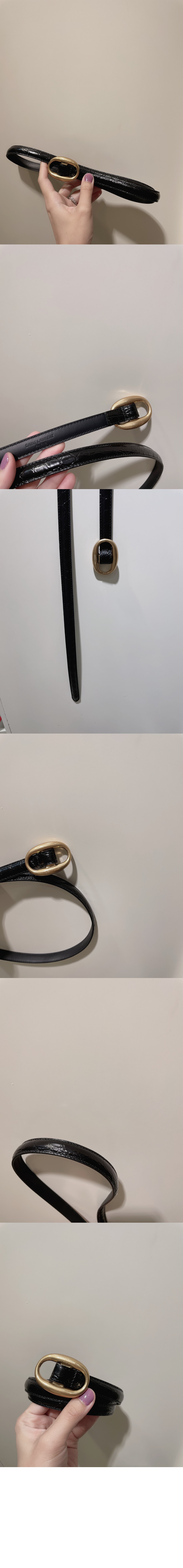 생로랑 부드러운 가죽 소재의 타원형 버클 슬림 벨트 756409