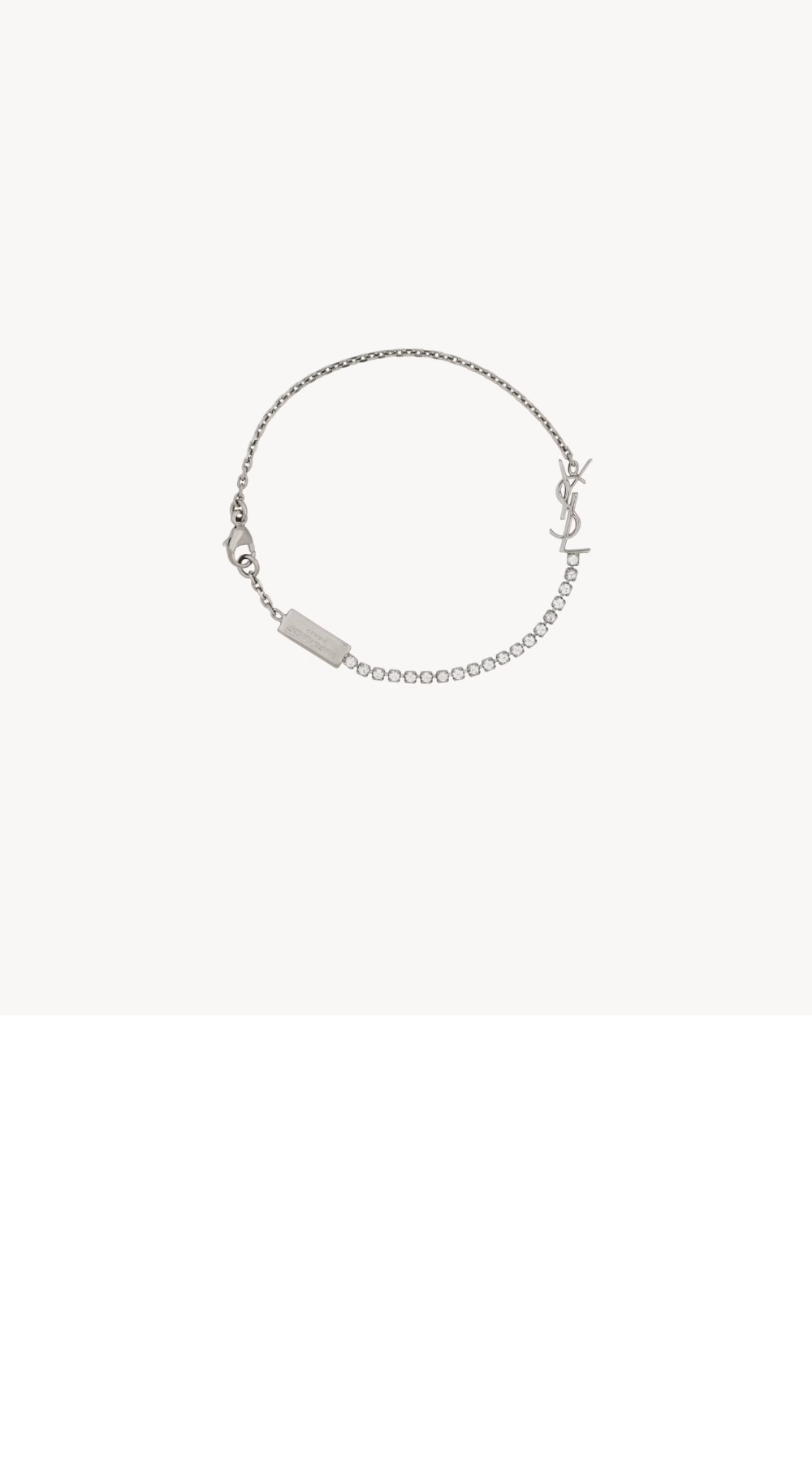 생로랑 메탈 및 라인스톤 소재의 CASSANDRE 참 브레이슬릿 712345
